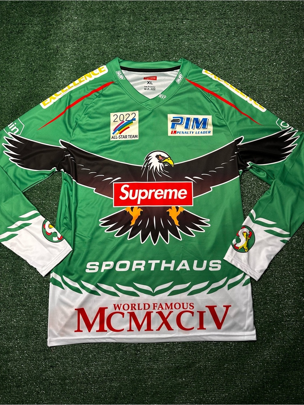 NHL Green, Black & White Eagle Graphic Jersey with Red Supreme Patch